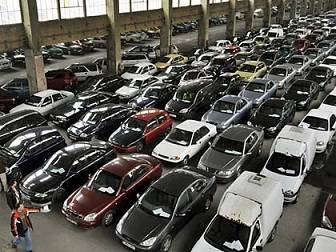 Warehouse full of bank repossessed cars
