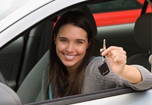 Beautiful woman in new car